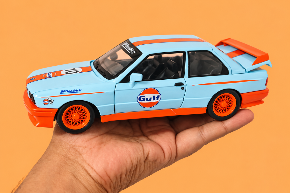1:24 Scale Die-Cast Metal 1982 B.M.W M3-E30 Car with Openable Doors, Pull Back Action,Lights,Music & Working Steering【Pack of 1】 (Sky Blue-Orange)